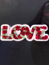 Композиция в каркасе LOVE с розами